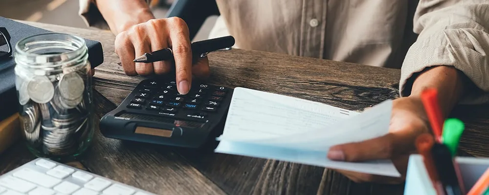 Person operating a calculator