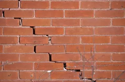 Cracked brick wall on a building
